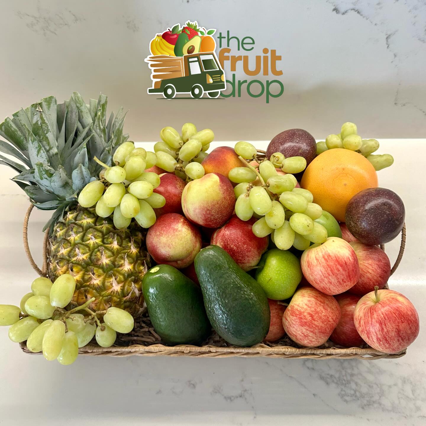 Premium woven hamper basket overflowing with seasonal fruit