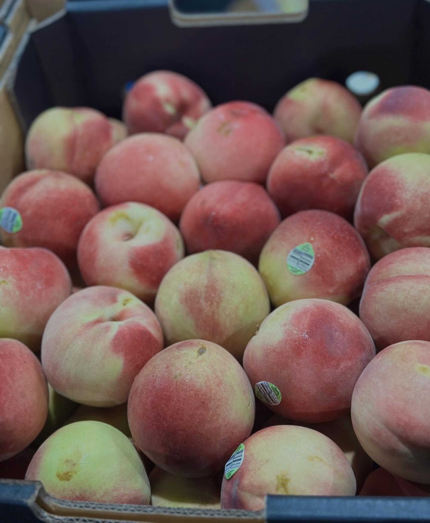 Close-up of fresh white peaches from Sydney Markets